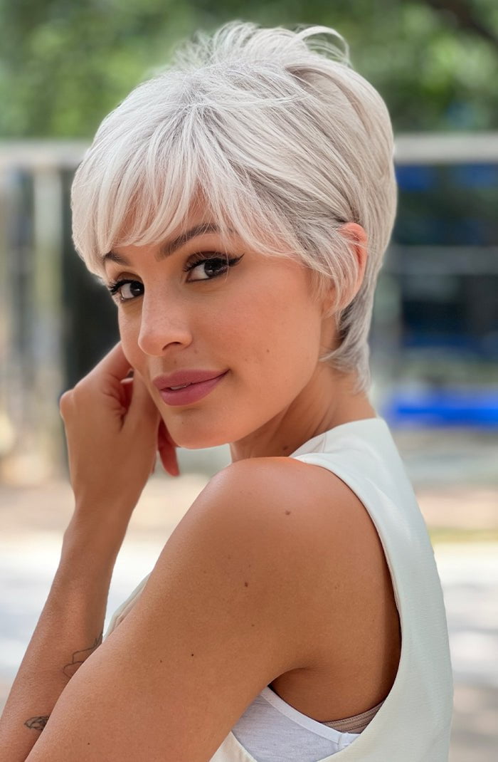 Model is wearing NAPOLI by Ellen Wille in LIGHT GREY MIX 60.56.58 | Pearl White, Lightest Blonde, and Black/Dark Brown with Grey Blend